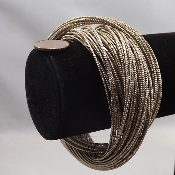 Antiqued Golden Brass Bangle Bracelets, Set of 60 Interlaced, 8 Inches - Picture 8 of 8